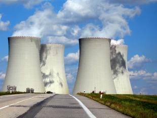 cooling towers under a blue sky