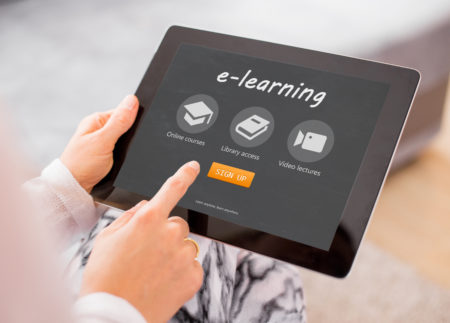OpenSesame Plus, hands holding tablet, eLearning page